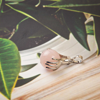 Natural Rose Quartz Hand Crystal Pendant in metal